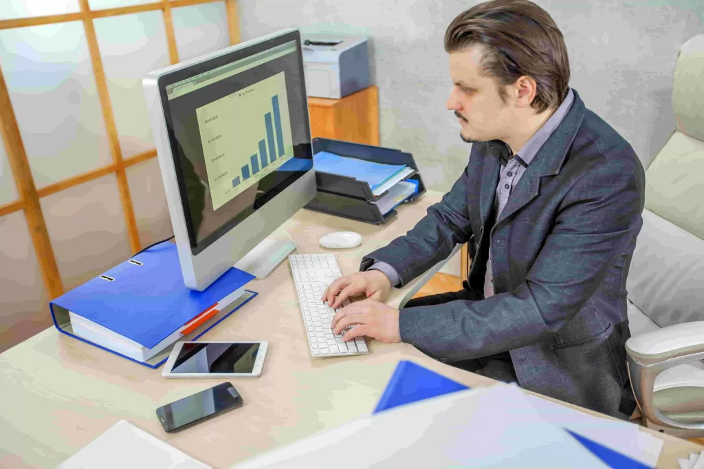 young-businessman-working-from-his-office