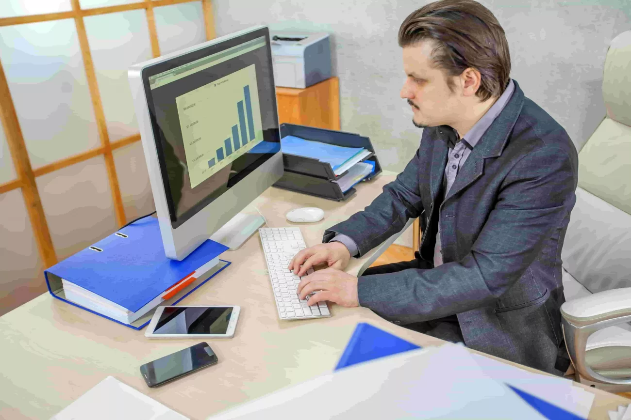 young-businessman-working-from-his-office